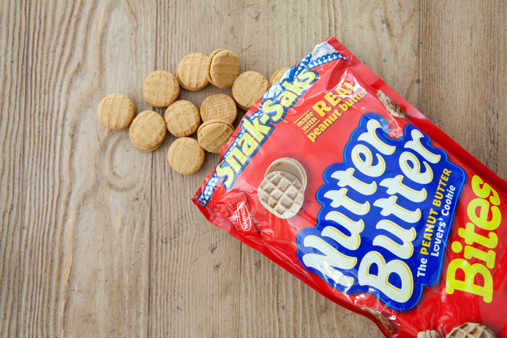 Nutter Butter Bites Mini Cookies falling out of packaging onto table